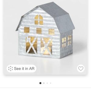 Galvanized barn decorative figure. Has tea light inside.